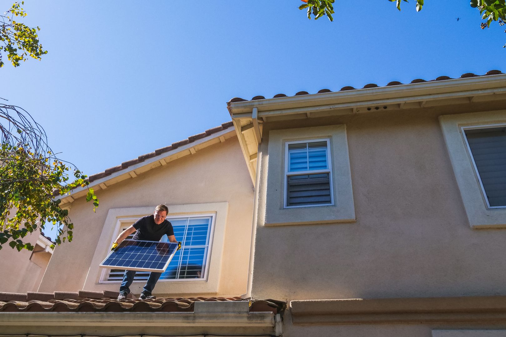 Solar panels on residential roof with battery system